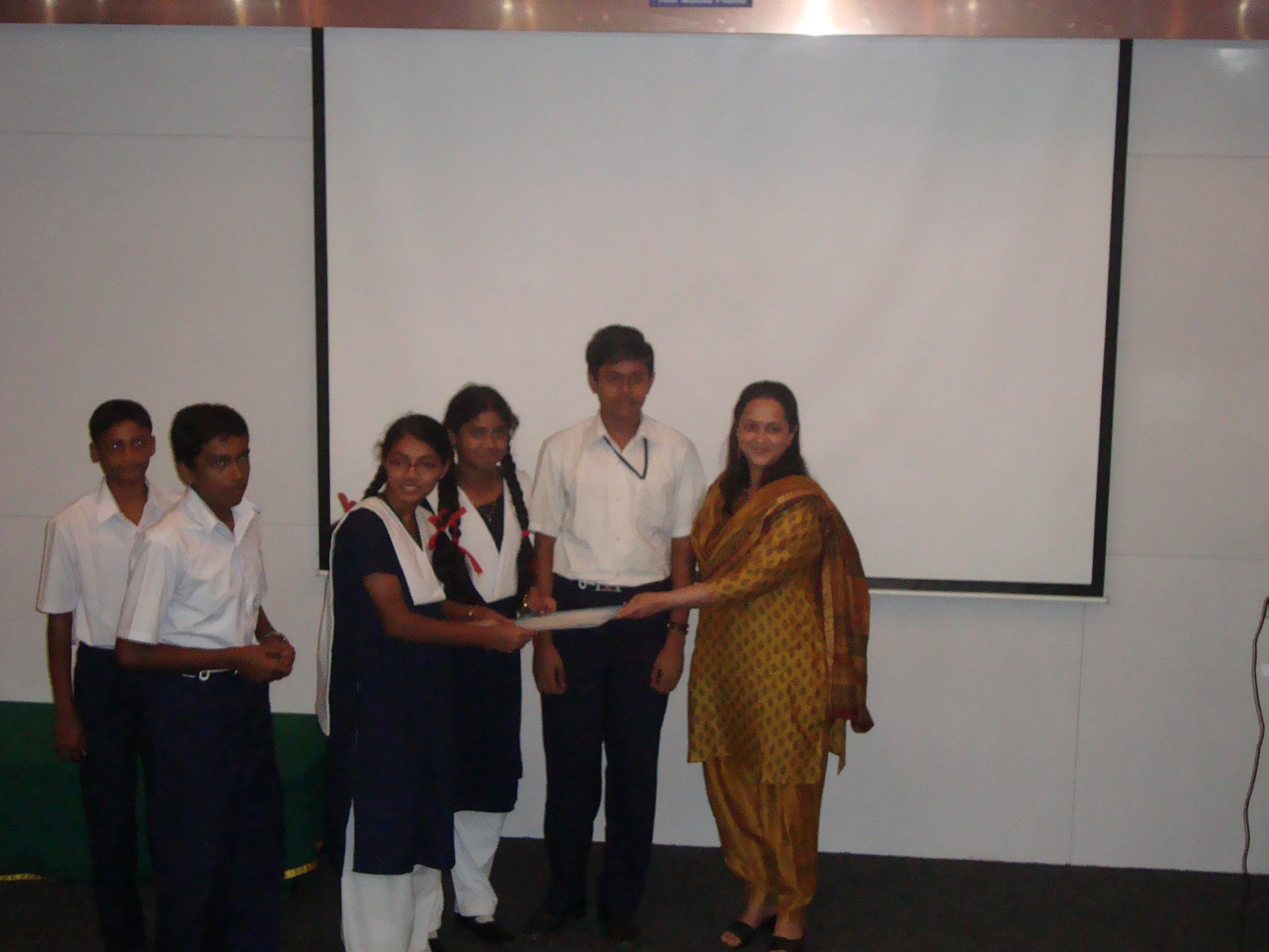 Ms.Rohini giving away the prizes