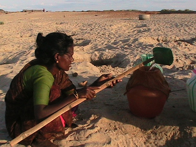 Woman Drawing Drinking Water in Dhanuskodi