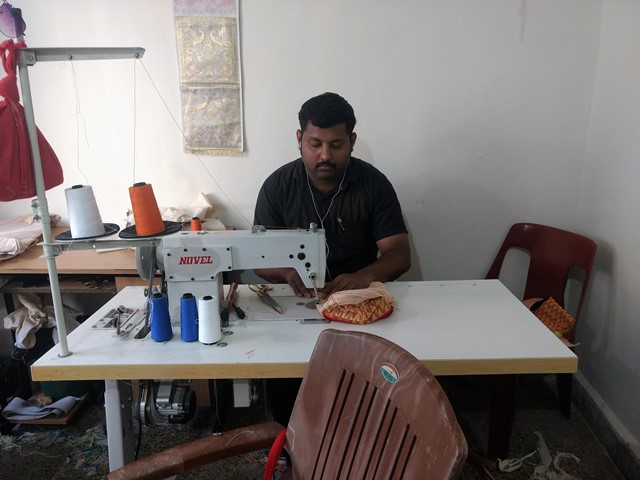 The fabric gets stitched into colourful bags at Pune.