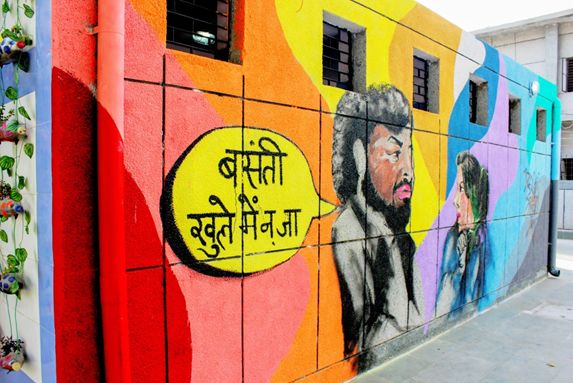 Pop culture icons like Gabbar Singh are painted on the complex walls. (Image: Project Raahat, Enactus)