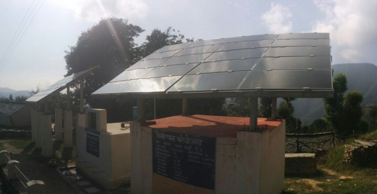 Solar panels and storage tank installed in Chureddhar village (Suryatilak village).