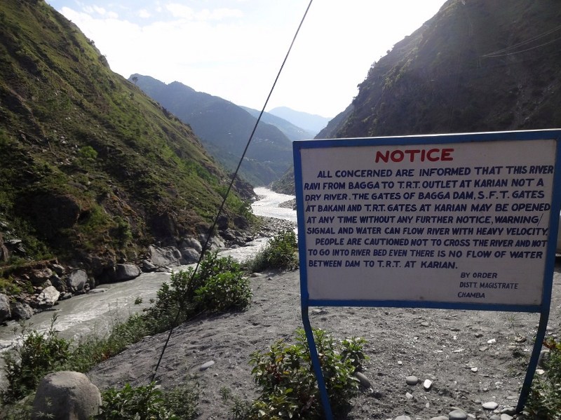 Warning sign near a dam in Chamba