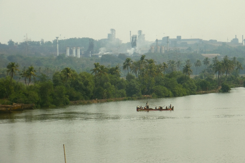 A factory stands close to an estuary in Goa.