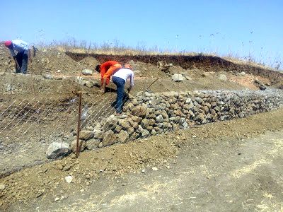 A gabion retaining wall, involving the tight packing of stones in a wire mesh (Image: Rahul Banerjee)
