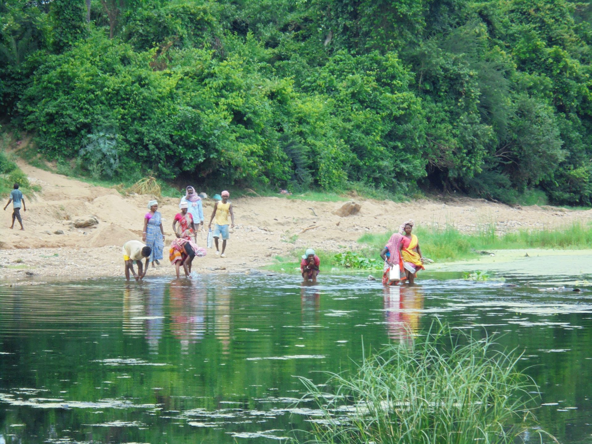 The villagers near the river Gara. They say that the waste slurry from the plant meets the river. Clearly the waters are not out of reach for the villagers.