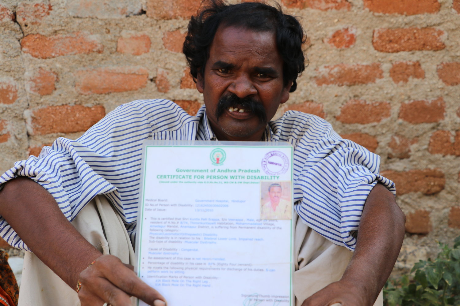 K. Veerappa stayed back in his village with his wife and elderly father while his friends left for cities looking for better prospects. He couldn't migrate due to his disability and is now struggling to make ends meet. (Pic courtesy: 101Reporters)