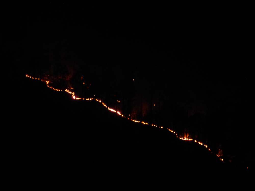 Flames visible late at night