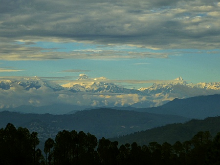 High Himalayas under a cloudy sky 