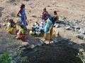 Women drawing water from a village well. Prior to watershed development and integrated water management, scarcity of water was a way of life for the people of Kumbharwadi (Image: WOTR)