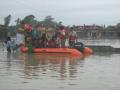 Members of the national disaster response force evacuate residents of a flooded village in Bihar. (Source: NDRF)