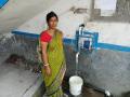 Nila Shaw collects water from the ADU. (Photo by Gurvinder Singh)