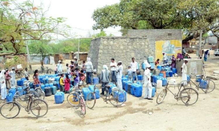 Long queues waiting for tankers are common in different parts of Maharashtra during water scarcity (Image Source: WOTR)