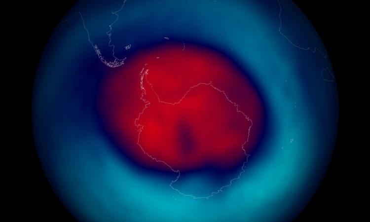 Edited NASA PR image showing the ozone hole for 2014 over the south pole. Red is bad, blue is good, e.g., red means not as much ozone as blue. (Image: Stuart Rankin; CC BY-NC 2.0)