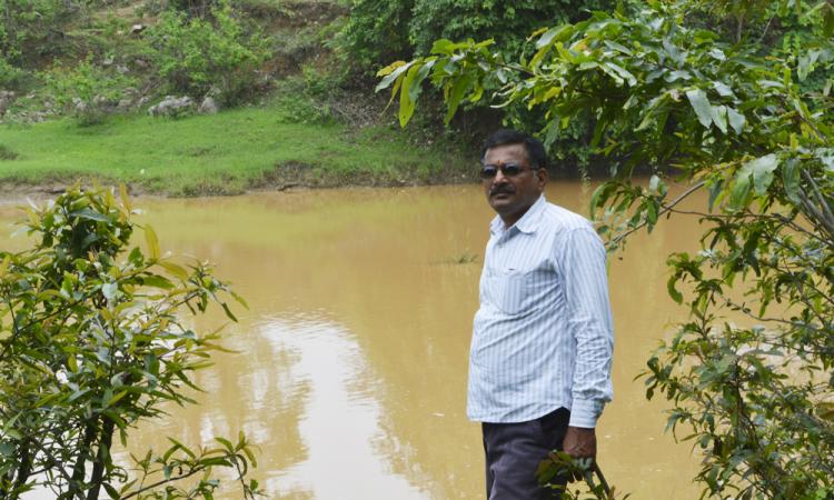 Punam Kumar Deshmukh at the proposed Mohar reservoir site near Banjaridihi village.