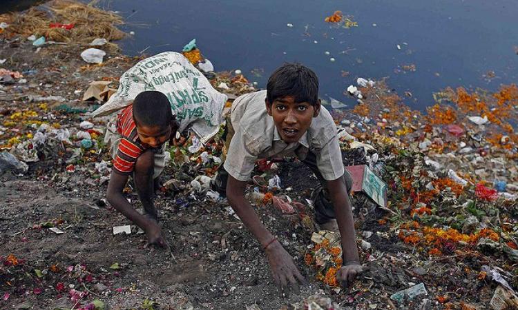 Garbage piled high near the Yamuna river (Source: IWP Flickr Photo)