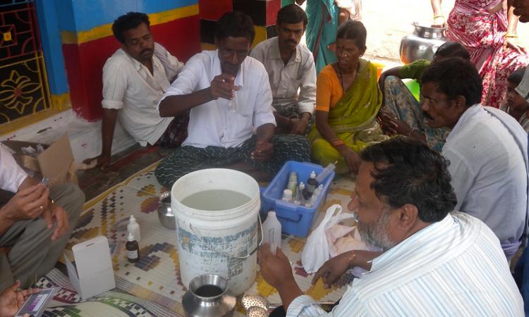 Residents of a village testing their water (Source: Arghyam)
