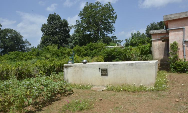 Rainwater harvesting tank at Madiya Kachar village school
