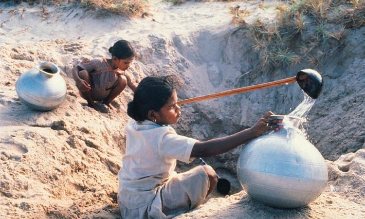 Indian children tapping water (Image: Global Water Partnership, Flickr Commons, CC BY NC-SA 2.0)