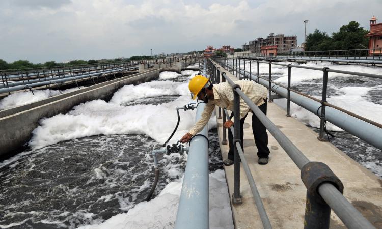Routine check done by the sewage treatment plant staff in Delawas, Jaipur. The plant is part of the ADB best practices projects list. (Image: Asian Development Bank, Flickr Commons) 