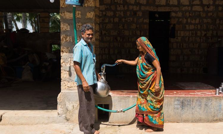 AKRSP has promoted rainwater harvesting to address the issue of scarce potable water at Mangrol. By encouraging households to collect rainwater using pipes on their roofs which then drain into an underground tank they have been able to promote water security. (Image: Aga Khan Foundation Flickr)