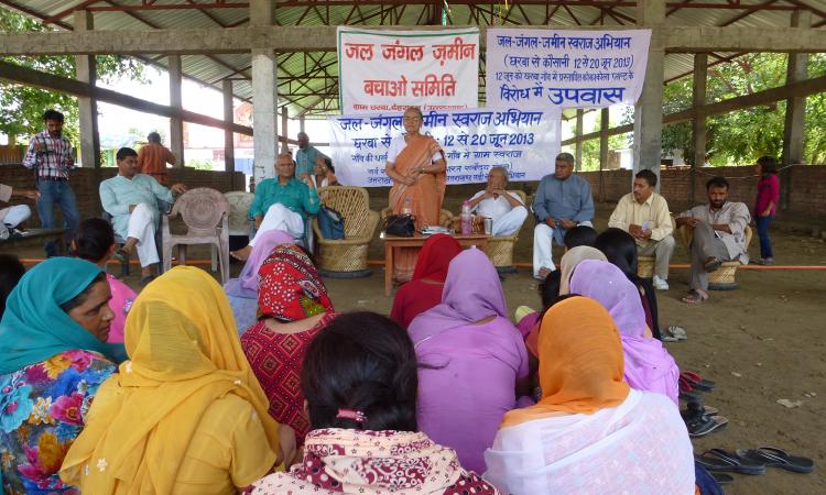 Radha Behen addresses the villagers