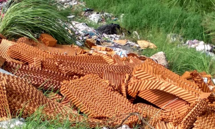 Leftover materials tossed out by the factories at the footwear park. These will end up in landfills and pollute the environment. (Image: India Water Portal)